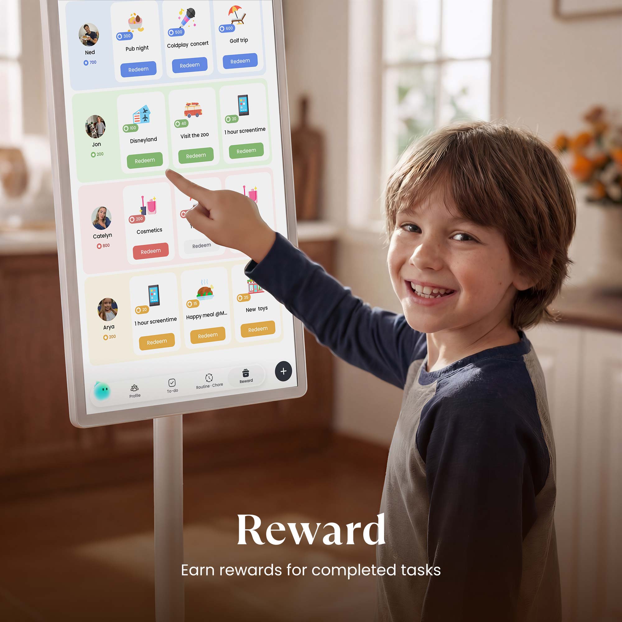 A happy little boy using the Reward feature on a Cozyla 32-in cordless Calendar+ Go